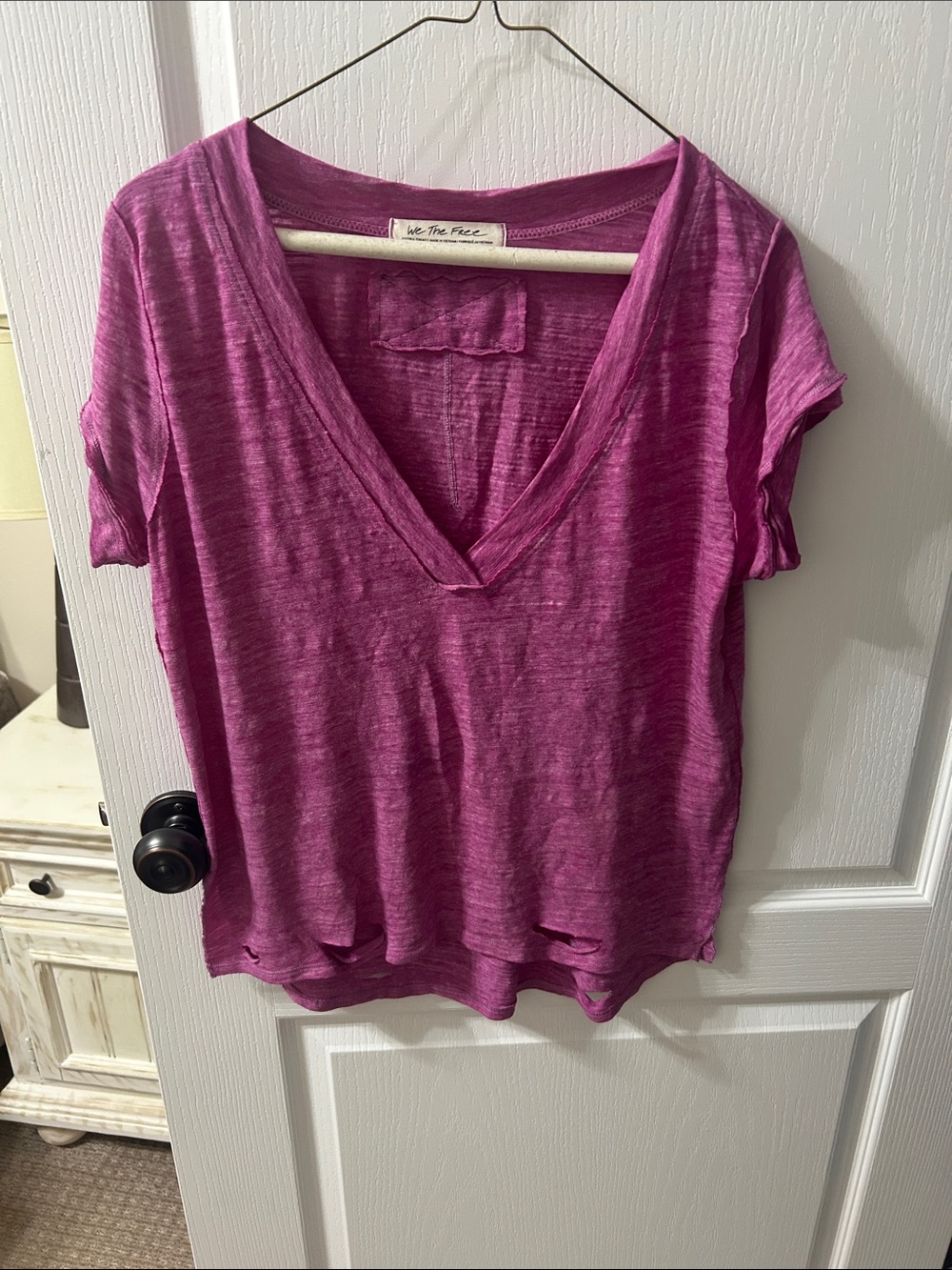 We The Free Fuchsia V-Neck Short Sleeve Tee with distressed at bottom